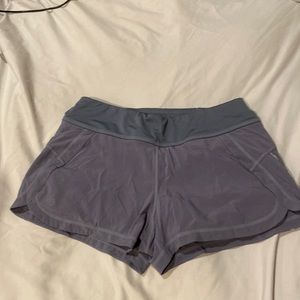 Athleta periwinkle athletic shorts with built- in spandex